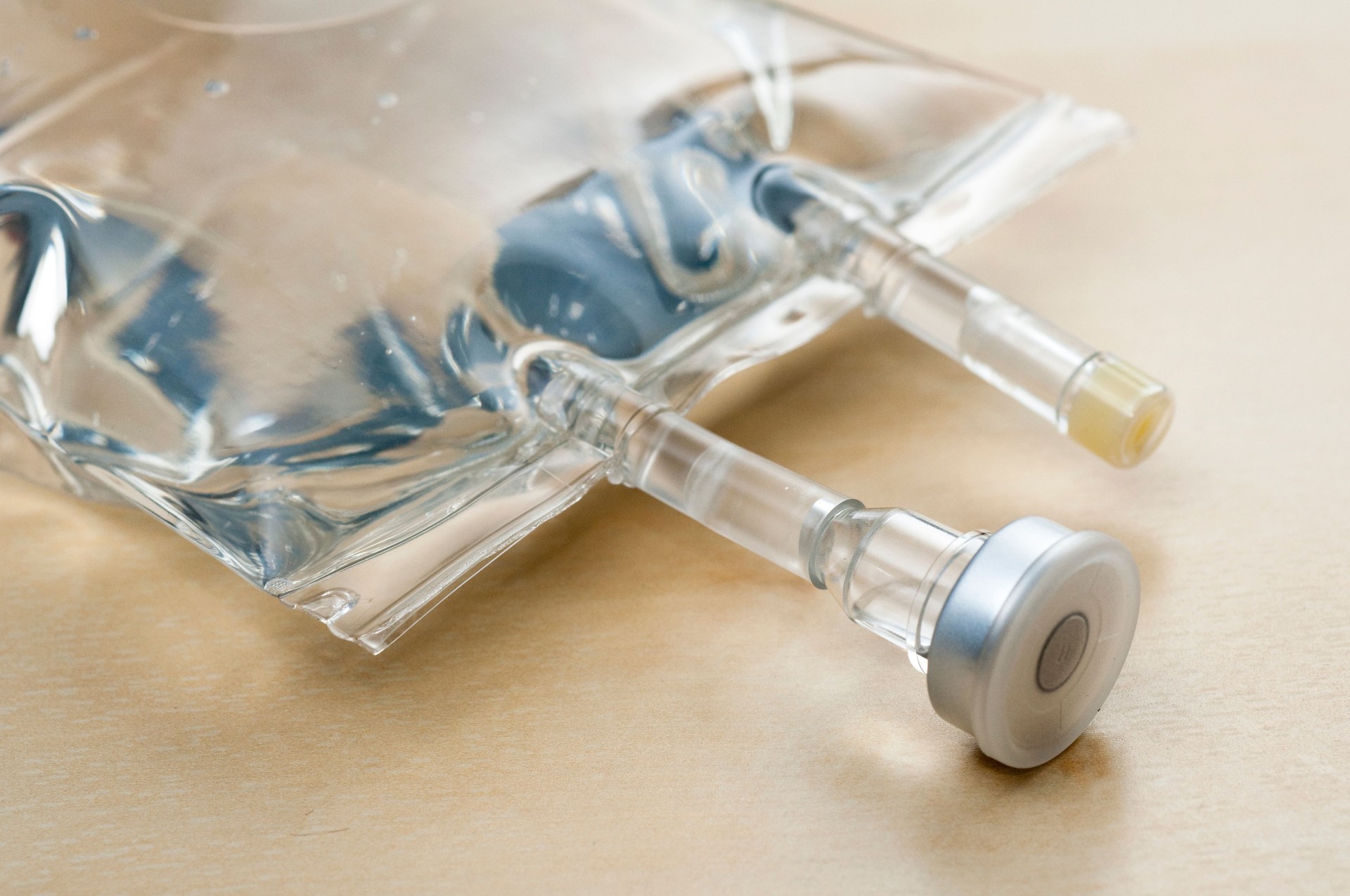 Saline bag on table