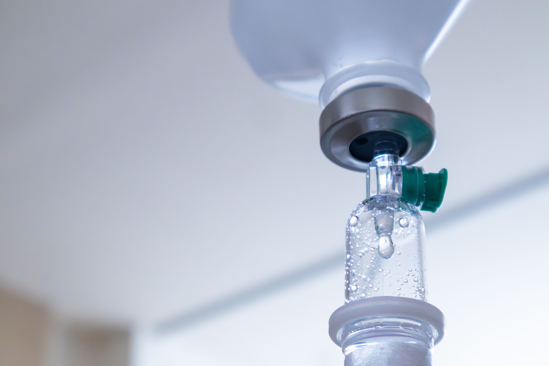 Hospital IV drip with vitamins, minerals and fluids intravenously through saline tubes.